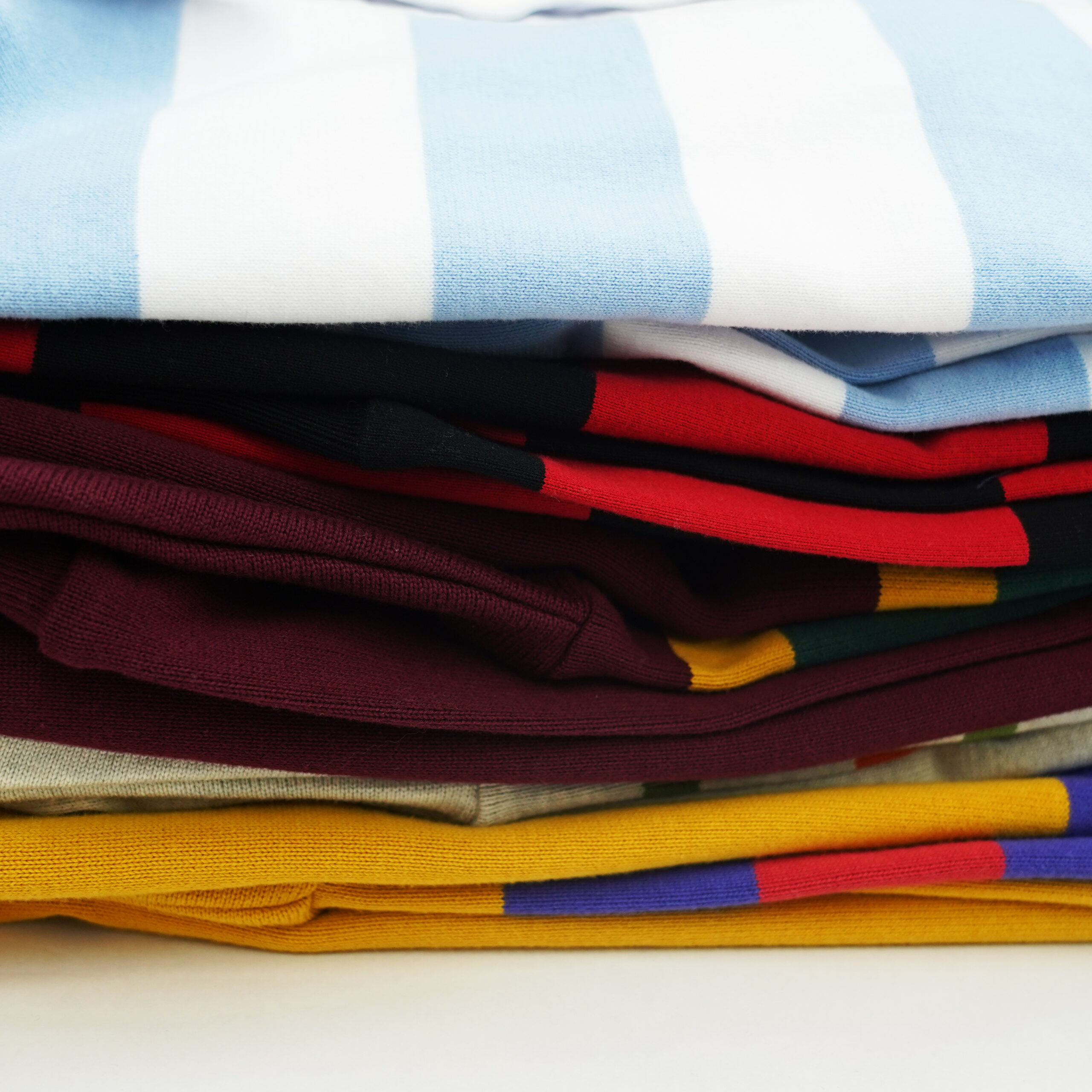 Close-up of polyester blend rugby shirt fabric at 200 g/m² with anti-odor finish for youth and leisure wear